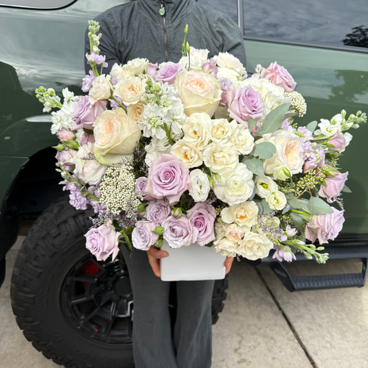Lavender and pastel luxury flower arrangement in ceramic vase
