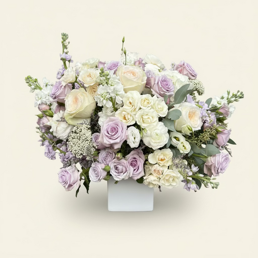 Lavender and pastel luxury flower arrangement in ceramic vase