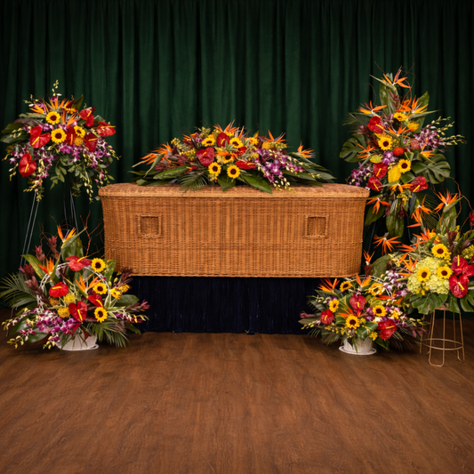 Wicker casket with colorful floral arrangements 