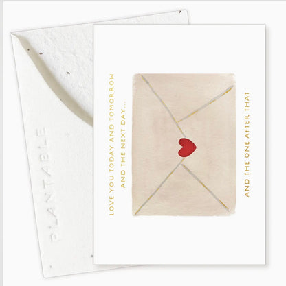 Plantable card with envelope and heart design on a white background