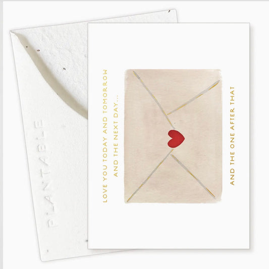 Plantable card with envelope and heart design on a white background